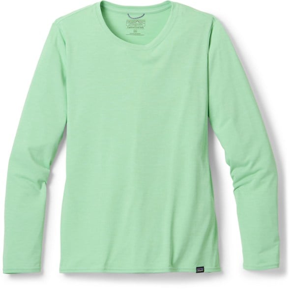 Patagonia women's long-sleeve hiking shirt in action during a mountain climb