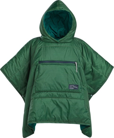 CozyKids Insulated Poncho displayed outdoors, showcasing its vibrant colors and comfort for kids.