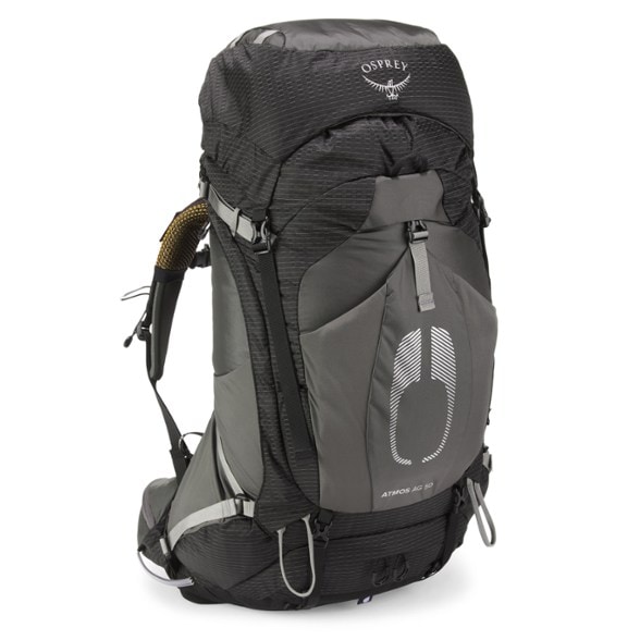 Side angle view of men's Osprey Atmos AG 50 backpack showing suspended mesh back panel and padded hipbelt
