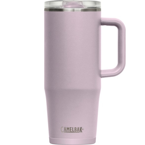 CamelBak Thrive 32 oz insulated travel mug with a hot drink on a picnic table.