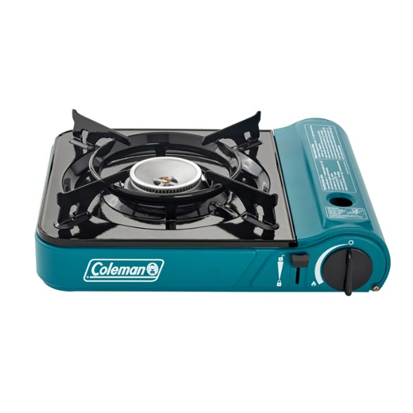 Front view of the TrailBlazer Portable Butane Stove being used at a picnic.