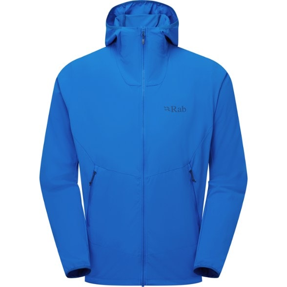 Men's Borealis Wind-Resistant Jacket shown on a rocky ridge during a hike, showcasing its lightweight and packable design.