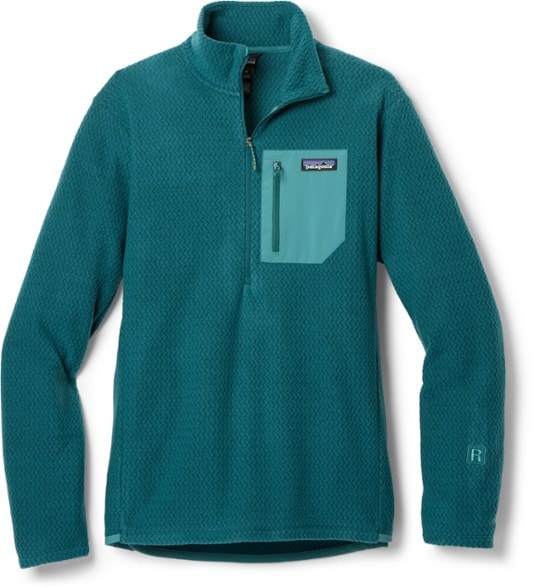 Eco-friendly pullover for men showcased in outdoor setting, highlighting its breathable fabric.