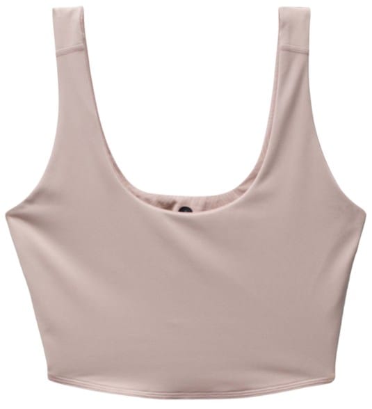 Front view of Luxara reversible tank top for women in gym setting, highlighting scoop neck design.