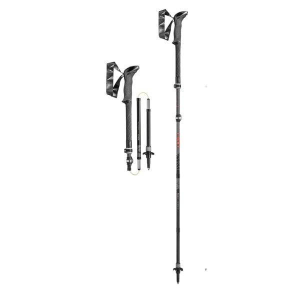 Side view of SummitFlex carbon trekking poles fully extended on rocky terrain