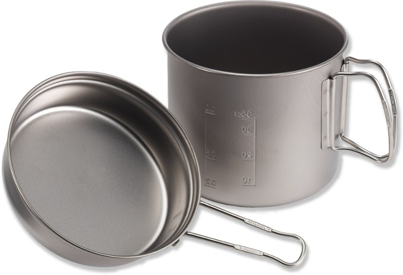 Trek 1400 Titanium Cookset with pot and frypan in outdoor setting, emphasizing ultralight cooking gear.