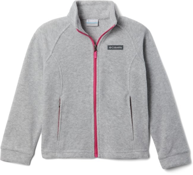 Columbia Benton Springs fleece jacket on a girl hiking in the woods, showcasing its comfort and style.