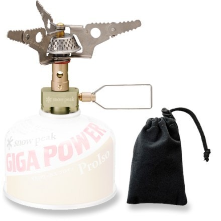 Folding-arm design of the UltraLite backpacking stove in a hiking setting.
