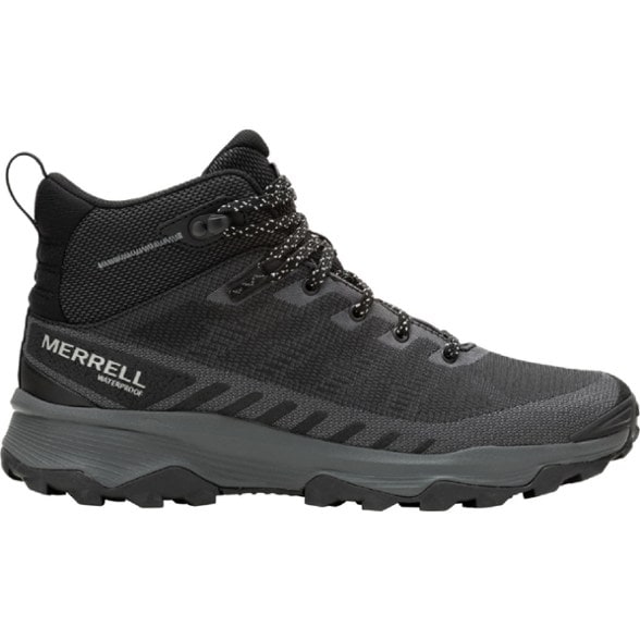 Men wearing eco-friendly waterproof hiking boots on a rocky trail.