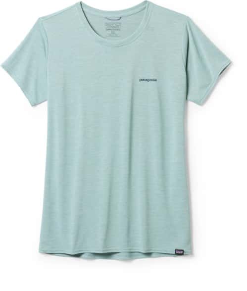Front view of the Patagonia women's t-shirt in motion on a trail