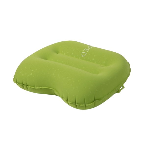 Side view of Exped Ultra backpacking pillow showing its anatomical design for camping use.