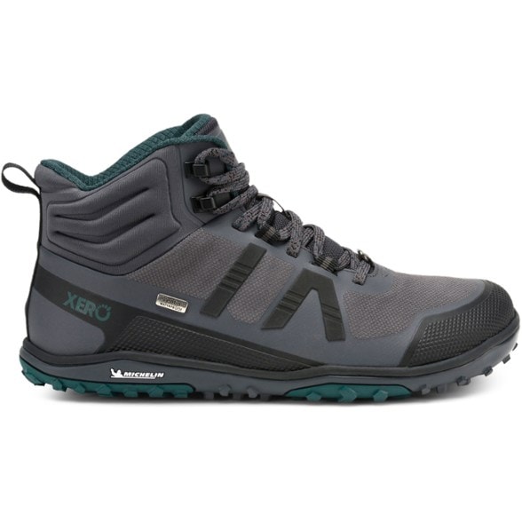 Front angle showing rugged tread and waterproof mesh upper on women's hiking boots