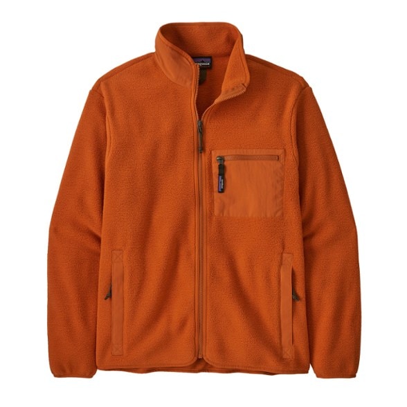 Patagonia Synchilla fleece jacket in action during a hike, showcasing its full-zip design and cozy fabric.