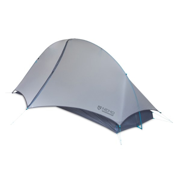 NEMO Hornet Elite OSMO tent set up in a forest, showcasing its minimalist design and spacious vestibule.