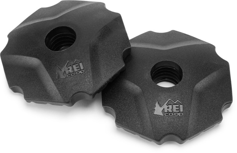 Close-up of REI trekking pole baskets designed for better stability in mud.