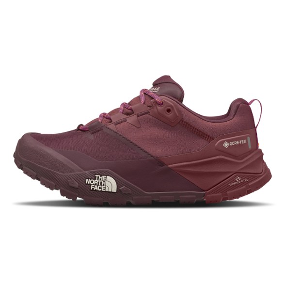 Side view of Trailblazer Women's GORE-TEX Hiking Shoes on rocky terrain.