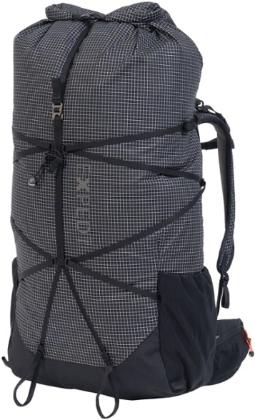 Exped Lightning 60 Women's Hiking Backpack in a scenic mountain setting, showcasing its lightweight design.