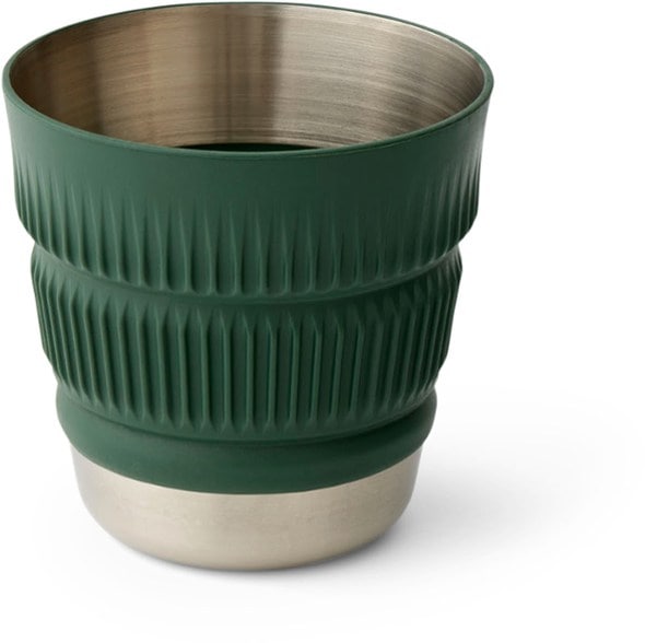 TravelMate collapsible mug with a silicone grip in a scenic outdoor setting.