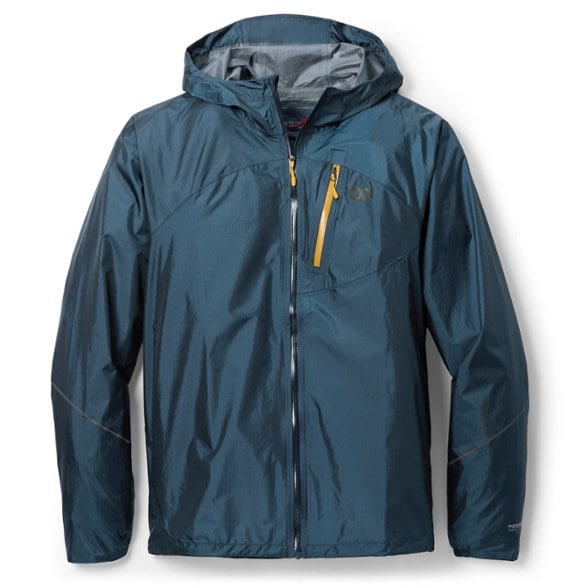 Men's Helium Rain Jacket shown in action during a heavy downpour, showcasing its waterproof features.