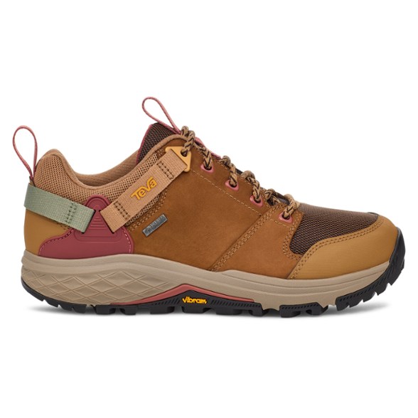 Side view of Teva Grandview GTX Women's Hiking Shoes showcasing the waterproof leather and durable construction.