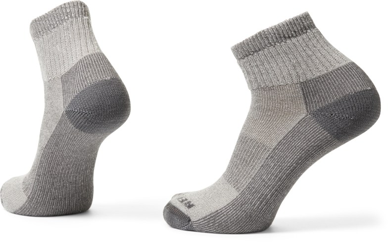 Close-up of Merino Wool hiking socks showing texture and fit on a rocky trail.