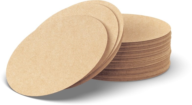 AeroPress XL coffee microfilters viewed from the side, showcasing their texture and size.