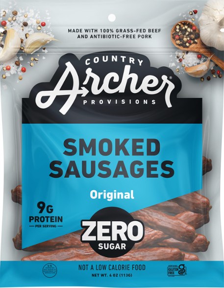 Close-up of Country Archer Jerky Co. Smoked Sausages in a hiking bag, showcasing their portable size.