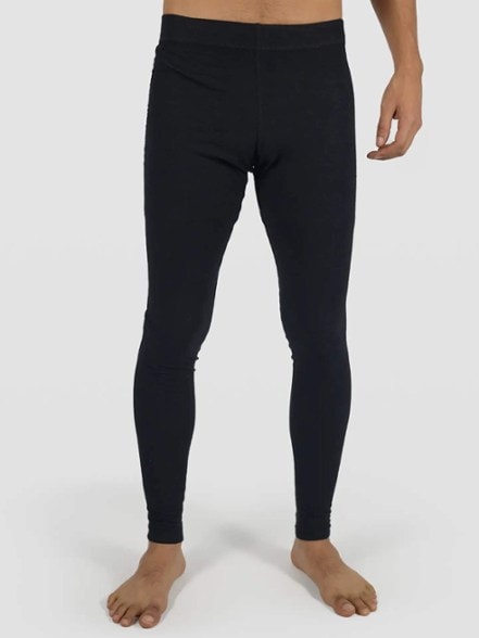 Men's ultralight alpaca wool leggings in action during a hike.