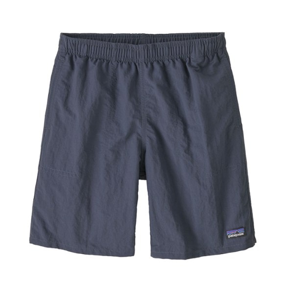 Patagonia boys' Baggies shorts in action during a hiking trip, showcasing their quick-drying fabric.