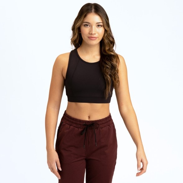 Side view of the Eva Crossover Sports Bra showing the breathable mesh back design.