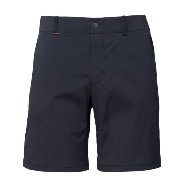 Side view of men's shorts on rocky hiking trail, showcasing concealed thigh pocket and gusseted inseam for climbing