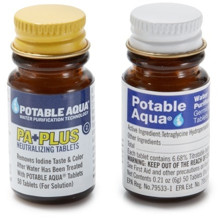 Close-up of Potable Aqua iodine tablets and taste-neutralizers, perfect for outdoor adventures.