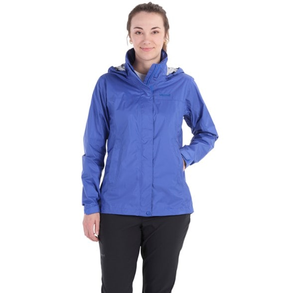 Front view of the eco-friendly women's rain jacket, showcasing its sleek design and adjustable cuffs.