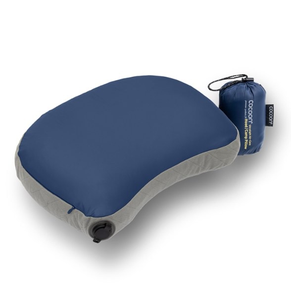 Top-down view of TrailNest inflatable pillow inside mummy-style sleeping bag hood, showcasing compact fit