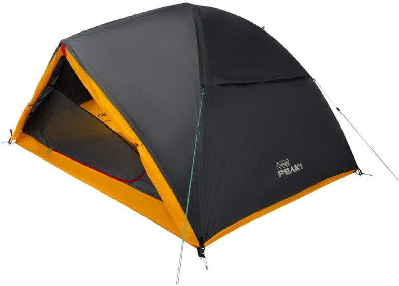 Side view of SkyTrail Duo showing vestibule space on a forest trail — perfect 2 person tent setup.