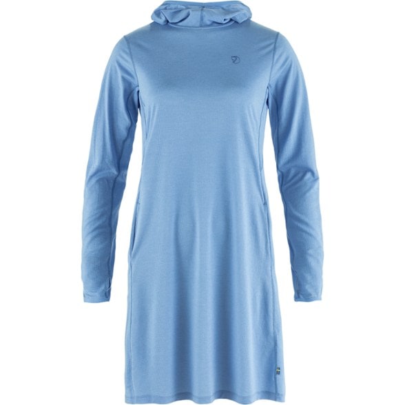 Fjallraven Women's Sun Hoodie Dress displayed outdoors with sunlight filtering through trees.