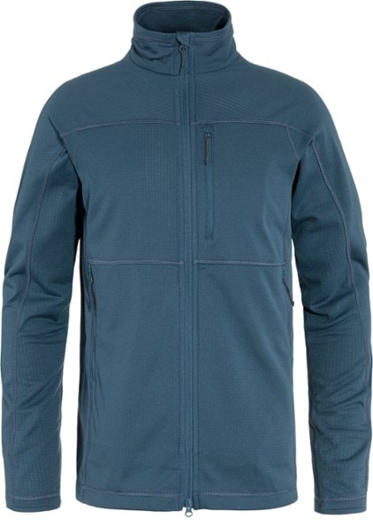 Fjallraven Abisko Lite Fleece jacket on a hiking trail, illustrating its lightweight packable design.
