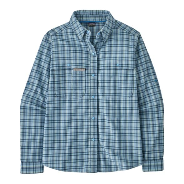 Patagonia Women's quick-dry fishing shirt in action on a fishing trip, demonstrating its comfort and flexibility.