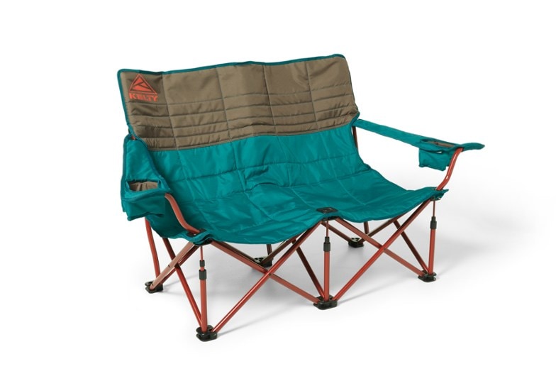 Kelty Cozy Camping Loveseat showing low-profile design near a campfire