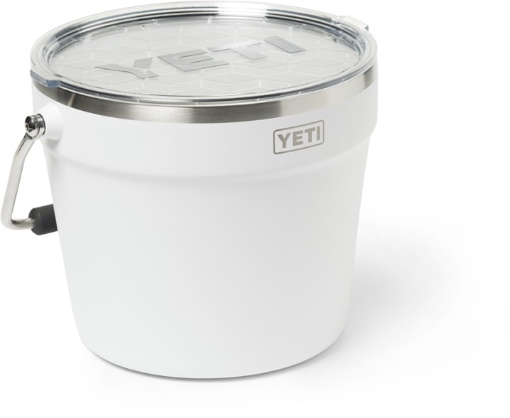 YETI ChillPro bucket shown on picnic blanket with wine and cheese, demonstrating use as cheap outdoor wine chiller for picnics.