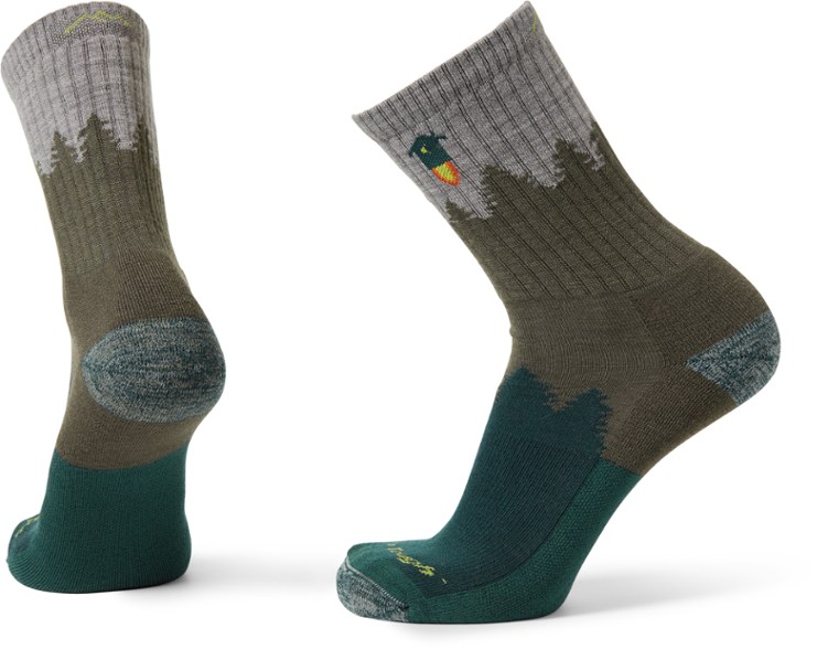 Men's merino wool hiking socks displaying cushion and fit from different angles.