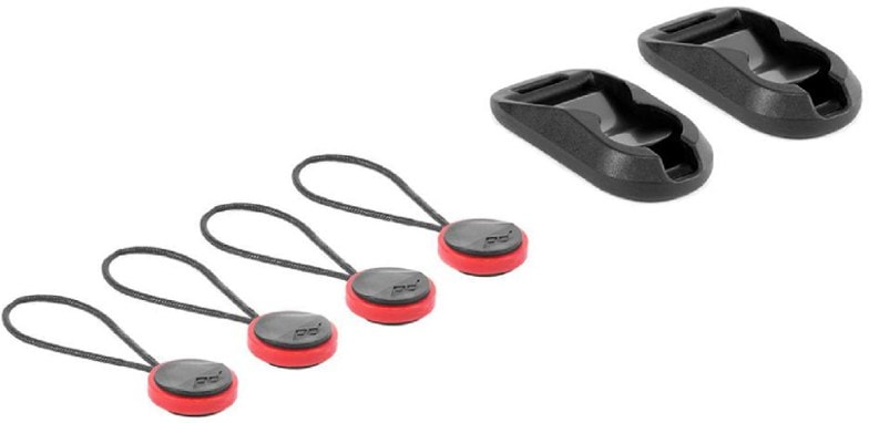 Peak Design Anchor Links connected to a camera strap, showcasing the quick release feature.