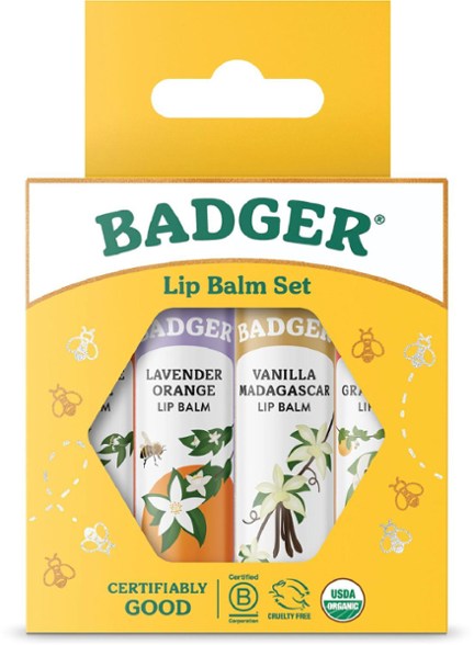 Close-up of Tangerine Breeze organic lip balm stick in hand
