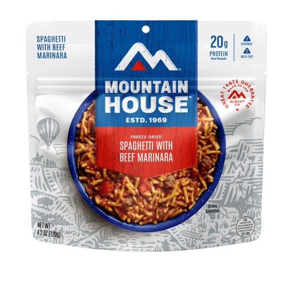 Hearty Beef Marinara Pasta in a camping setting, showing preparation steps.