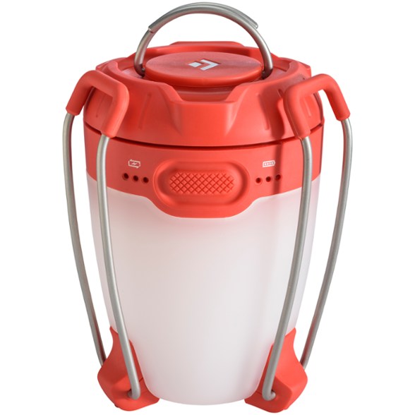 Lumos Camping Lantern Pro in a campsite setting, illuminating a picnic area.