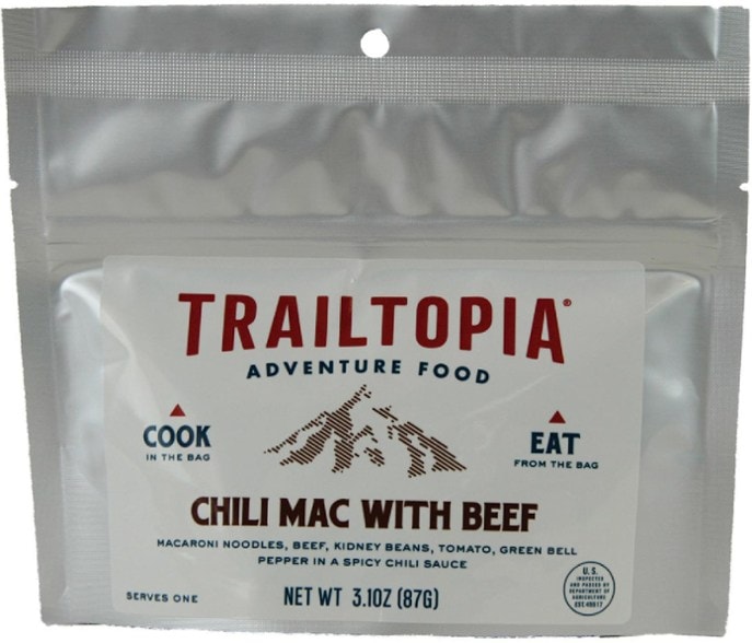 Chili mac with beef prepared in a camping setting, showcasing the meal ready to eat.