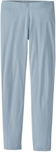 Patagonia kids' thermal leggings displayed outdoors, showcasing their warmth and comfort.
