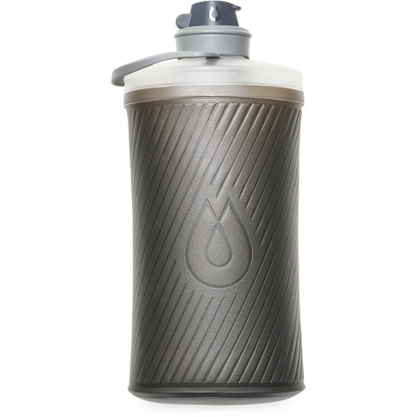 Side view of the HydraPak Flux Collapsible Water Bottle in a hiking setting.