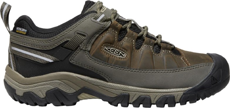 Side view of KEEN Targhee III men's hiking shoes on rocky terrain.