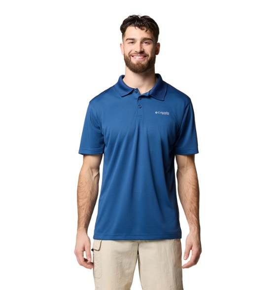 Front view of StreamGuard breathable polo shirt worn during a sunny outdoor hike